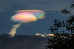 redlipstickresurrected:  Léo Caldas (Brazilian, based Brasília, DF, Brazil) - A big show in the sky of Brazil on February 27, 2018 evening with this lenticular Iridescent cloud forming just before sunset.   Cloudscape Photography