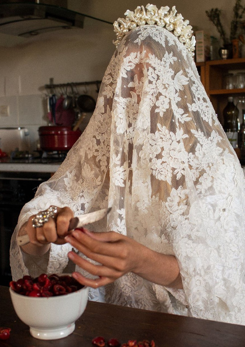 lemonsharks:bienenkiste:Photographed by Estelle Hanania for Simone Rochaprepping cherries in all whi