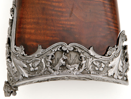 A heavily engraved and chiseled percussion muzzleloading rifle crafted by Giacomo Rinzi of Milan, ci