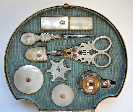 ganymedesrocks:arsenicinshell:Rare and beautiful sewing kit. The carved shell lid mounted cabinet an