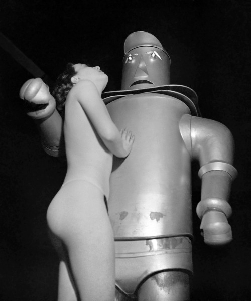 20th-century-man:Exotic dancer and robot, Paris, France, c. 1935 / photo by Gaston Paris.