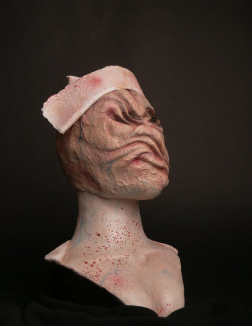 You are looking at a life size Silent Hill Nurse Bust sculpted and finished by the very talented artist Justin Shifflett. The Bust was sculpted with Chevant clay then molded and cast in latex with a polyfoam core. The bust was then finished with a super