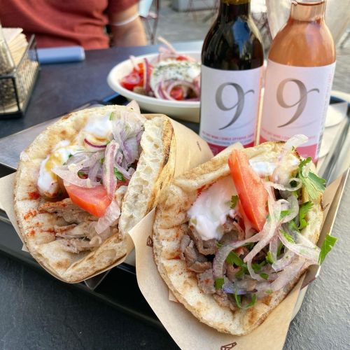 Pork and lamb pitas with Hoocut spiced sauce, tzatziki, tomato, red onion, paprika.  Athens GR  @hoo