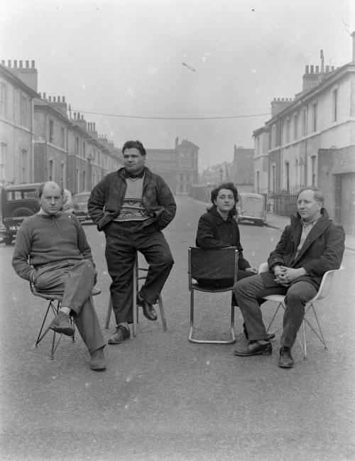 “Photograph showing Nigel Henderson, Eduardo Paolozzi, Alice and Peter Smithson, seated in an 