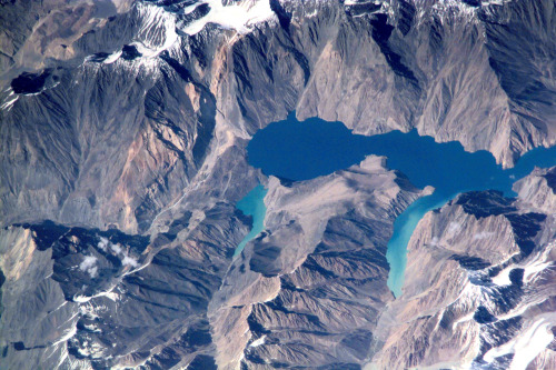 Lake SarezWithin the rugged Pamir Mountains of Tajikistan lies Lake Sarez, a very young lake basin t