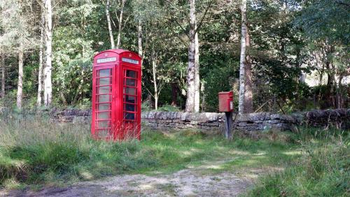 A North Yorkshire Moors Church.England.By chance I stopped my car to snap thetelephone box then spie