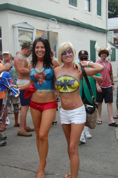 XXX nerdybodypaint:  Supergirl and Batgirl at photo