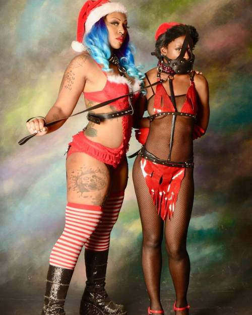 heavymetalgoddess:Christmas came early with model: Nikki Nuit Model: Britney Siren Photographer: Pho