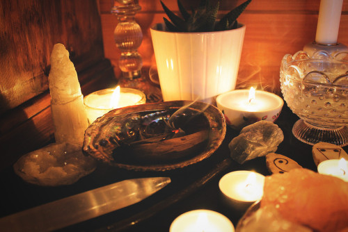 thenativewitch:  Here’s my sacred space all lit up! Much more magickal. I don’t know if 