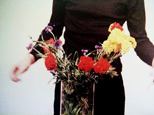 likeafieldmouse: Bas Jan Ader - Primary Time (1974) “Depicting the constant reorganization of a flower arrangement, yellow, red and blue flowers in a mixed assortment are constantly swapped and reconfingured until suddenly they are composed entirely