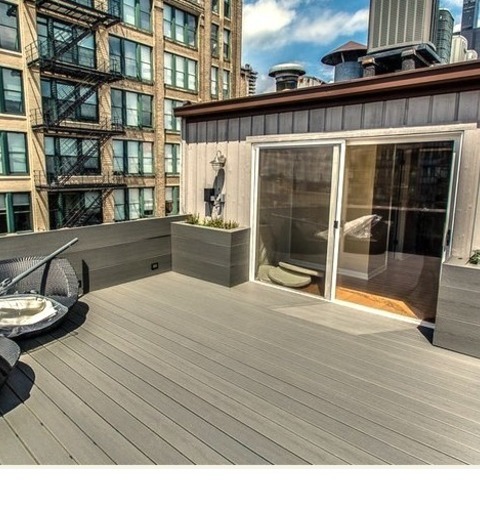 Modern Deck Chicago Inspiration For A Mid-sized Modern Rooftop Deck Remodel With No Cover