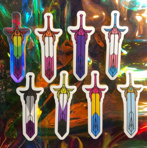 sosuperawesome:Pride She-Ra Pins, Stickers and Resin SwordsTatianas Art Shop on Etsy