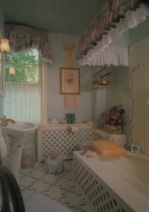 vintagehomecollection:Soft florals and custom latticework surrounding the tub are just two highlight