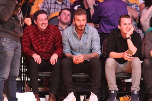 ylviswagger: Ylvis at a basketball game, sitting next to David Beckham. nbd. Source