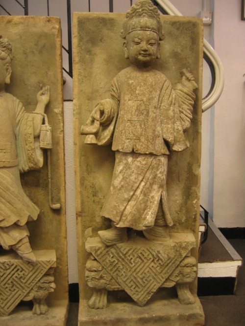 A pair of Ming dynasty sandstone couple tiles