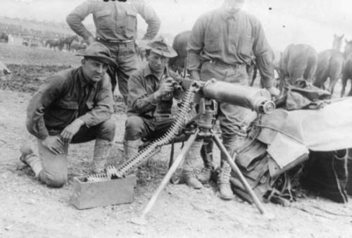 US Army soldiers firing a maxim gun during exercises in Texas, 1911.