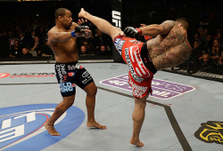 rearnakedchoking:  Daniel Cormier dodges a headkick from Frank Mir @ UFC on Fox 7.