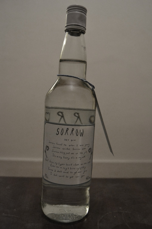 wasp-nest:  idneverdreamofit:  I made a design for a bottle of gin based on the song ‘Sorrow’ by The National. I love this song and its lyrics and I’ve wanted to do some work based on it for a while. One day I had this idea and had to execute it.