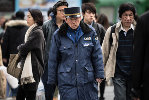 Yamashita san, a tired old worker at the Shibuya crossing.The Japanese government has decided to rai