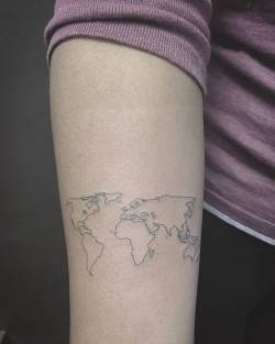 cutelittletattoos:World map outline tattoo on the right inner forearm. Tattoo artist: East