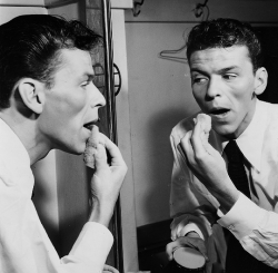 Francisalbertsinatra: Frank Sinatra Applying Pancake Makeup In His Dressing Room,