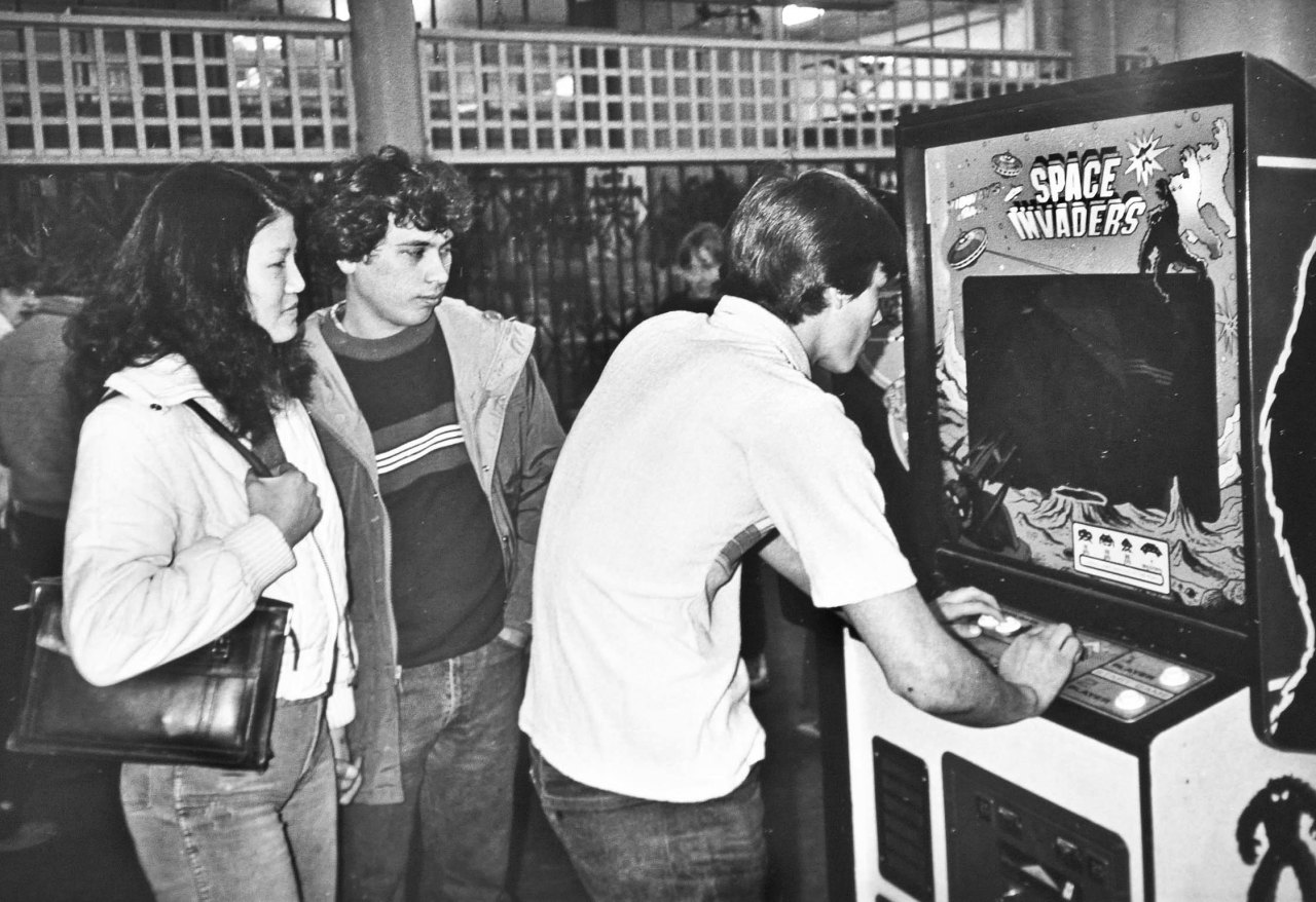 rogerwilkerson:  Playing Space Invaders, photograph by Ira Nowinski