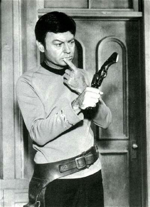 trek-tracks:Bones is just not great at holding a weapon in any universe…He’s a doctor, not a marksma