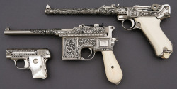 twippyfan:Ivory and Pearl gripped pistols. Heavily engraved. Luger, Mauser, Colt 