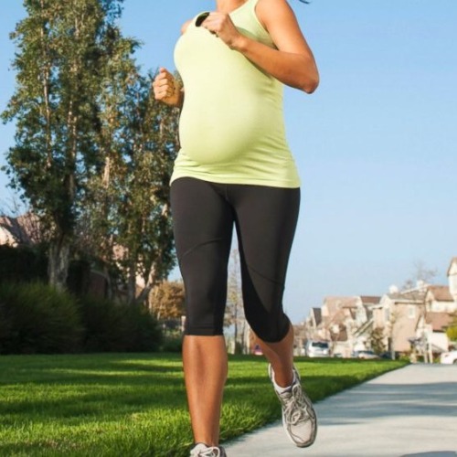 Sexy pregnant moms exercising in tight leggings