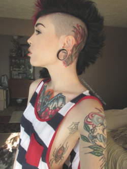 ciarachimera:  lafemmedangereuse:  andgioisstillhonest:  ciarachimera:  Getting a decent photo of the tattoo on the back of my head by myself is next to impossible. This is as good as it gets, you can kinda see my shark sea monster and a lot of the blood