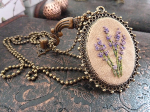 Hi everyone!I recently started up a store on Etsy, featuring embroidered frame necklaces, pressed fl