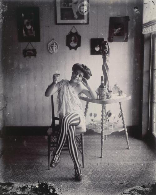 Woman with striped stockings by E.J. Bellocq, c.1912 (NGV) from the Storyville Portraits series (c.1