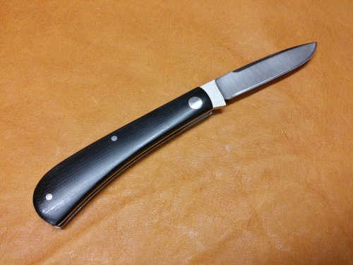 mpdwa:  Rick Menefee Shadow Trapper ATS34 steel and Micarta handles 