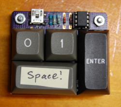migurski:  Why have a Happy Hacking Keyboard when you can have an Unhappy Hacking Keyboard. Real programmers only need a 1 and 0 key. 
