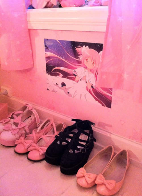 frillypinkdreams:  Look at my cute new madoka poster that came in the mail today! :D Also, some of my shoes x3