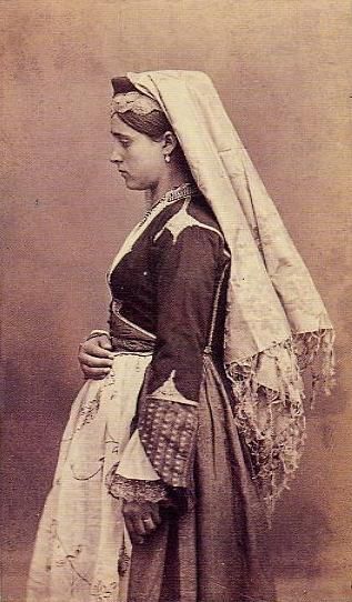 alatismeni-theitsa:A Cretan Woman of Candia in native costume. Crete Greece. Date Late 19th-early 20