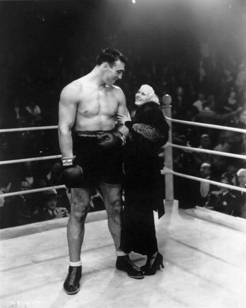 vintagesportspictures:Actress Jean Harlow poses with boxer Primo Carnera (1933)