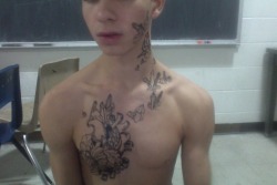 m0mg0away:  to answer a few questions: that “tattoo” was just liquid eyeliner that my friend painted on me for a project.  which is also why i’m shirtless in a classroom. and no, it wasn’t on the wrong side. the image was just flipped. 