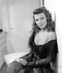 ritahayworthdaily-blog:  Rita Hayworth poses in a chiffon negligee at her home in Beverly Hills, 1945 