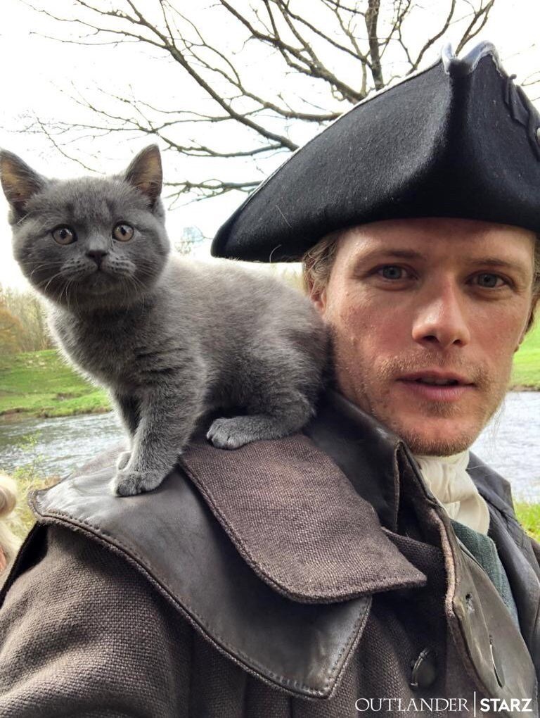 Sam Heughan from Outlander and Adso the cat