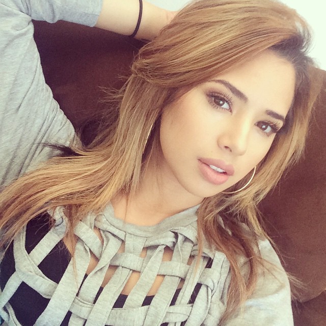 mizzjasminevillegasnewz:  Hoops and a hair tie around wrist