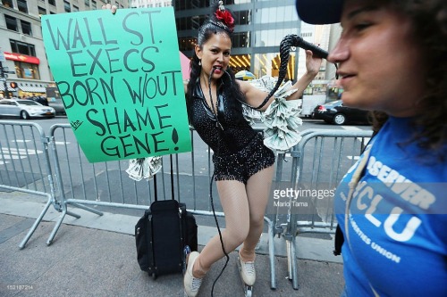 femalesruletheworld:  This is Marni Halasa, a performance artist who moonlights as the “Bank Reform Bitch,” an Occupy Wall Street dominatrix character. Her mission is to spread the message that “naughty bankers” should be “seriously spanked.”