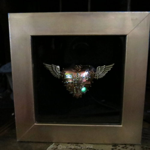  Framed Flying HeartHere is one of my signature steampunk pieces - the mechanical flying heart. Alth