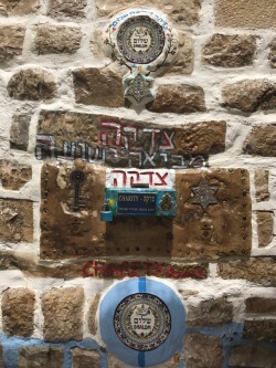 truejew:Tzedaka box in Tzfat.  Tzedaka is often translated as ‘charity’ but this is not a fully functional translation. Charity is something one does out of kindness. Tzedaka comes from the word tzedek which means justice. It is a moral imperative