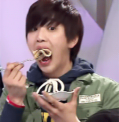 replay3:  Sandeul enjoying “a bite”.of his favorite food….. 