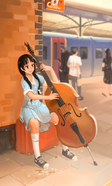 Akiyama Mio playing some slap bass for train fair.I dont even know if she can play traditional slap 