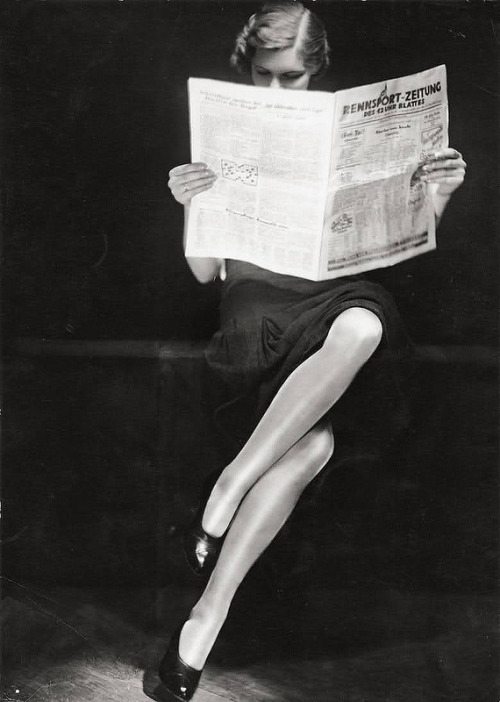 fuckyeahvintage-retro: A lady reading newspaper, 1932 (via)