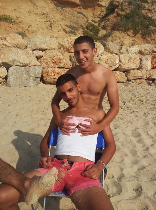 Groping on the beach… Wish  you had titties, lol