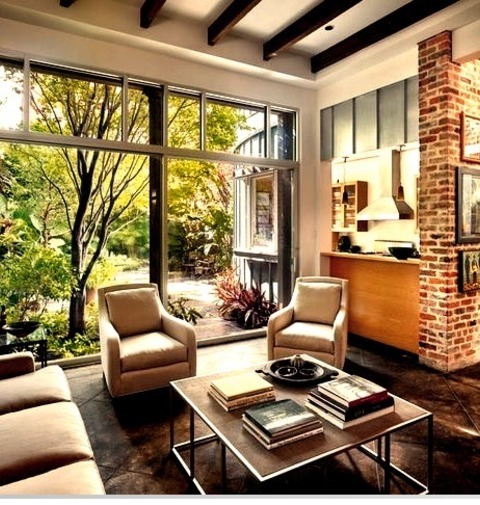 New Orleans LibraryExample Of A Large Transitional Concrete Floor And Brown Floor Family Room Library