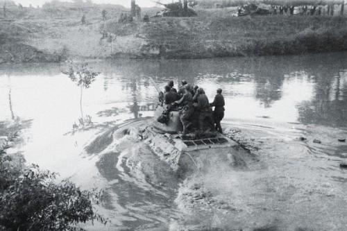 Soviet tank attempting to ford a river, WWII